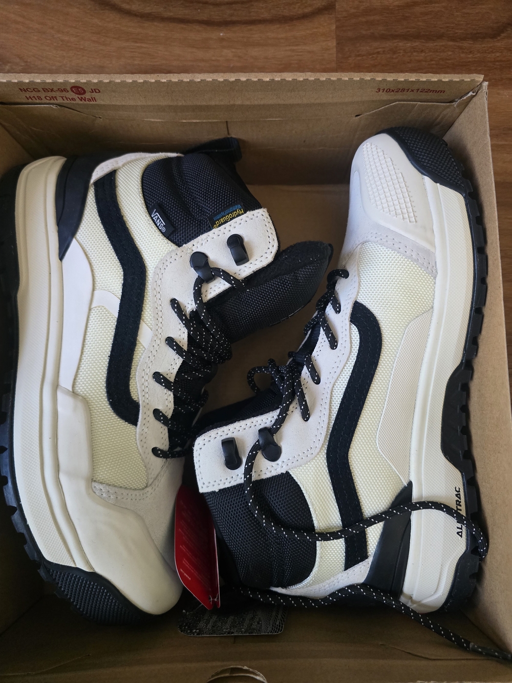 Vans All-TRac High-Top Sneakers in Cream & Black